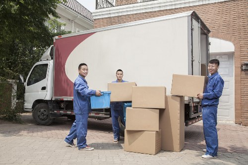 Professional moving team handling apartment access in Knightsbridge